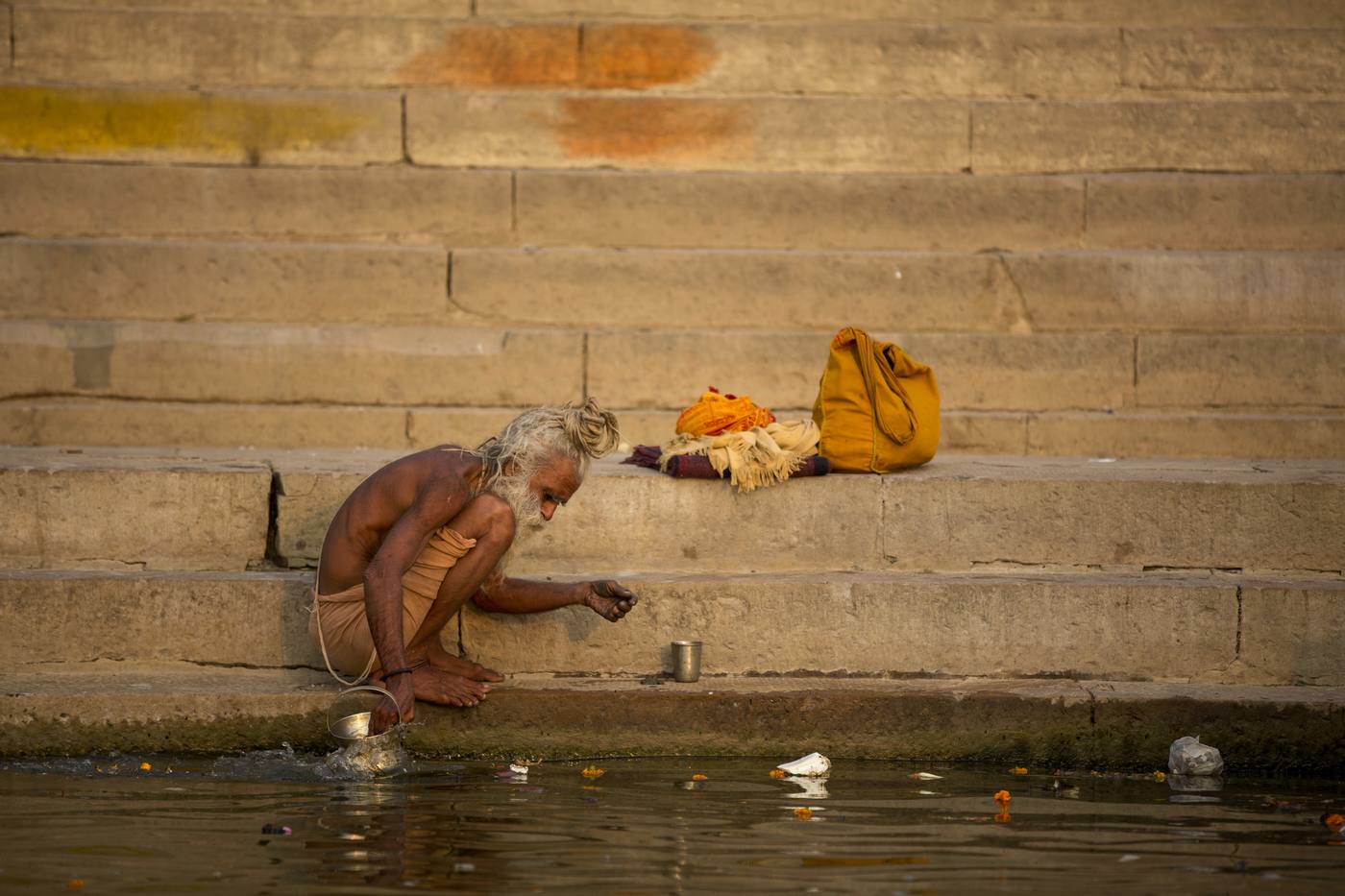 Senior yatri by the river