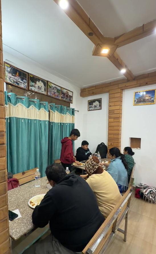 Yatris enjoying breakfast by Hindu Tours